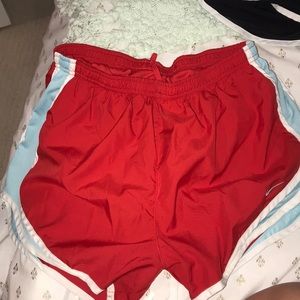 Red and blue dri-fit Nike shorts